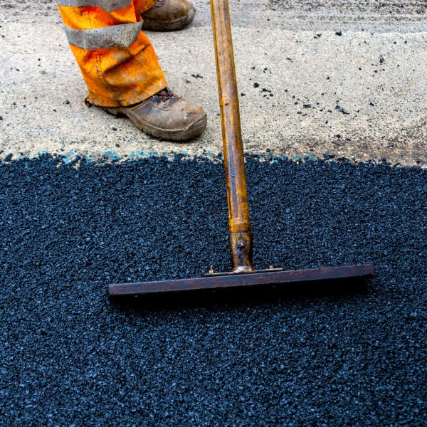 Worker,On,Asphalting,Paver,Machine,During,Road,Street,Repairing,Works